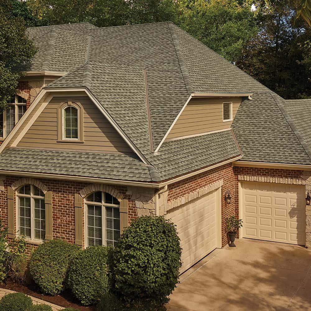 House with GAF Timberline UHDZ shingles in weathered wood installed in Columbus
